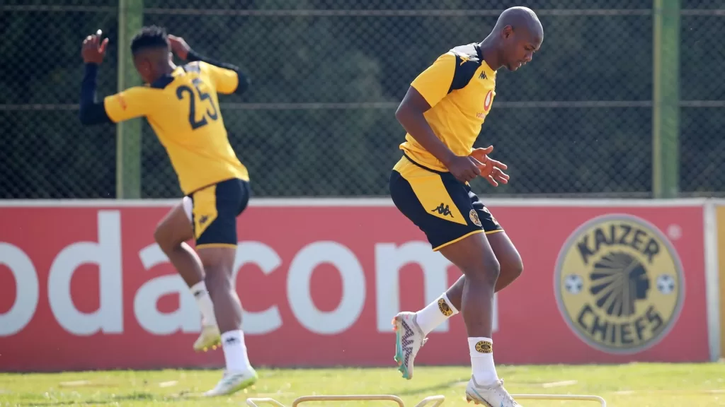 Njabulo Ngcobo of Kaizer Chiefs with a teammate at training