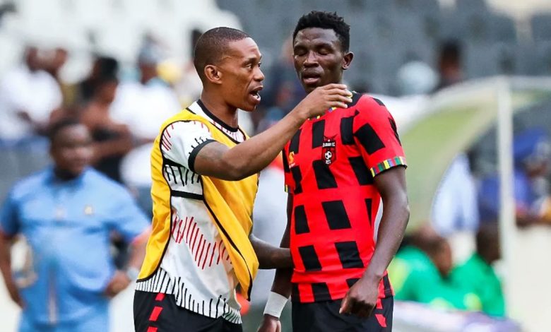 Vuyo Mere alongside his teammate in the DStv Premiership