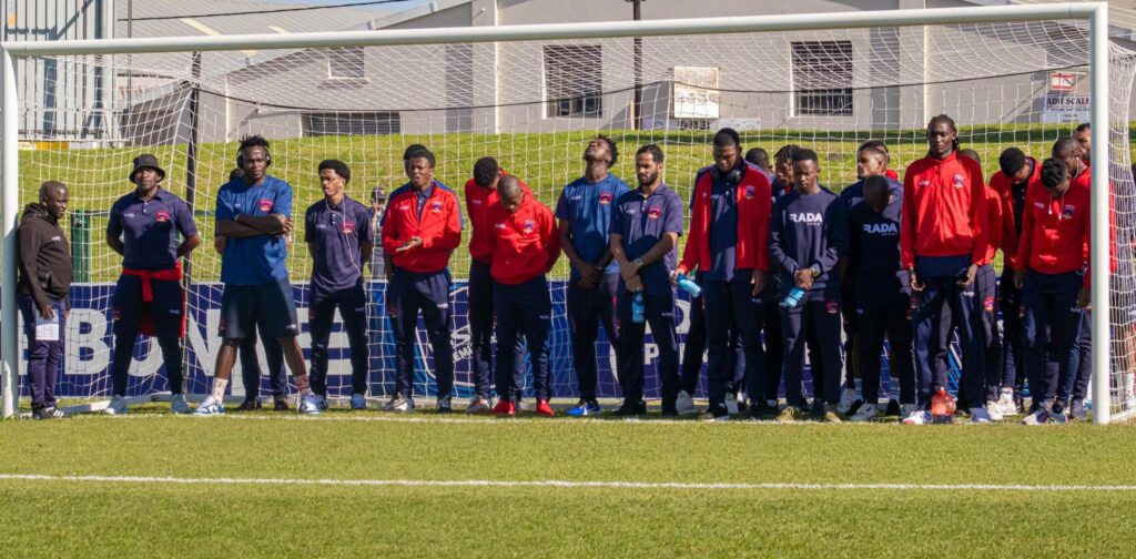 Chippa United players during pitch inspection