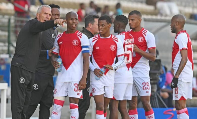 Ernst Middendorp with Cape Town Spurs players on the sidelines
