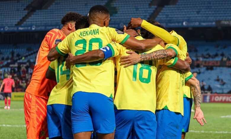 Mamelodi Sundowns players celebrate a victory in the DStv Premiership