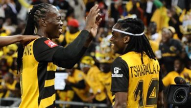 Siphiwe Tshabalala and Reneilwe Letsholonyane celebrate a goal for Kaizer Chiefs