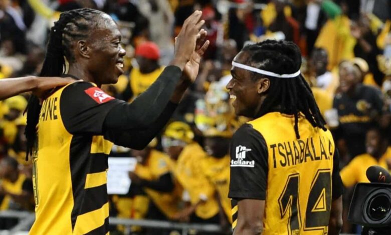 Siphiwe Tshabalala and Reneilwe Letsholonyane celebrate a goal for Kaizer Chiefs