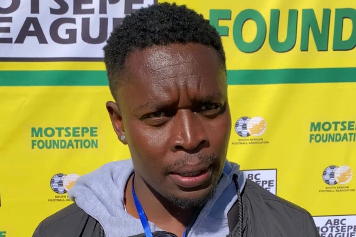 Coach Tshepo Motsoeneng in a post-match interview during the ABC Motsepe National Playoffs