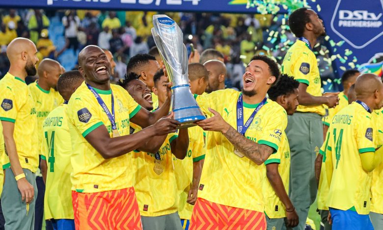 Mamelodi Sundowns stars lifting the DStv Premiership trophy