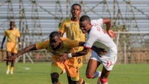 Jomo Sono's former player Onke Moletshe striking the ball
