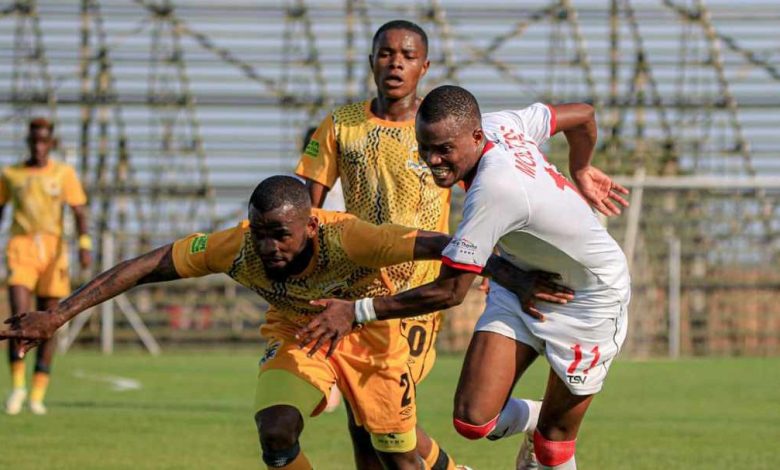 Jomo Sono's former player Onke Moletshe striking the ball