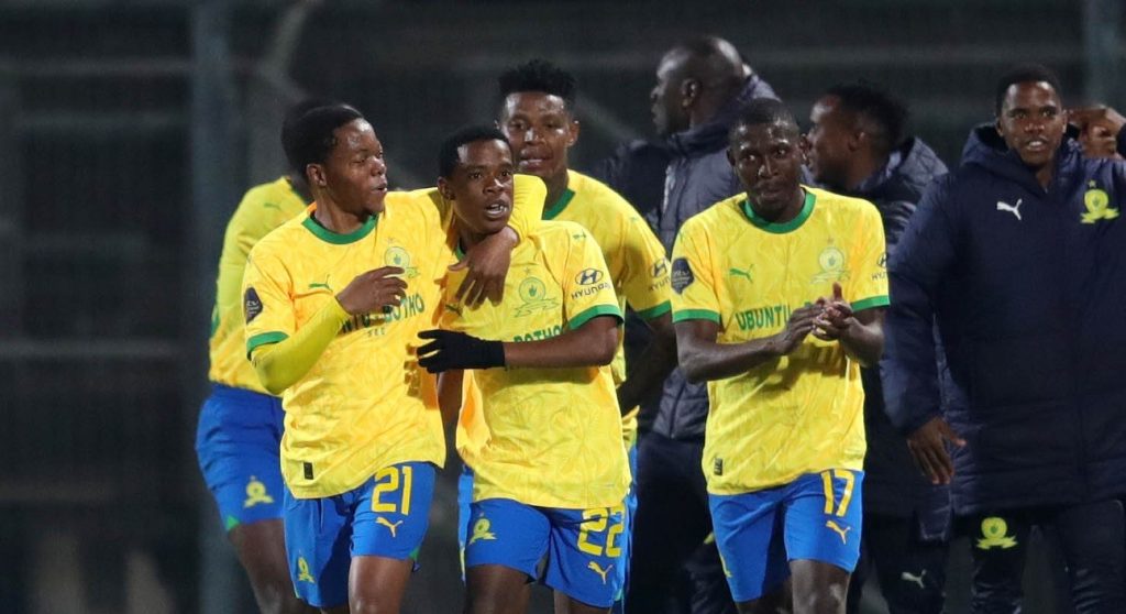 Siyabonga Mabena celebrates with Mamelodi Sundowns teammates after scoring a goal