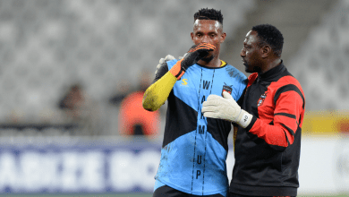 Greg Etafia with Melusi Buthelezi on the sidelines