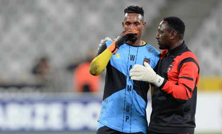 Greg Etafia with Melusi Buthelezi on the sidelines