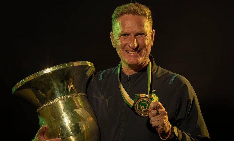 Shawn Bishop poses with a Mamelodi Sundowns trophy