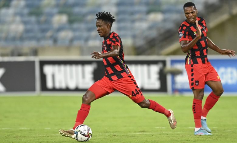 Orebotse Mongae striking the ball