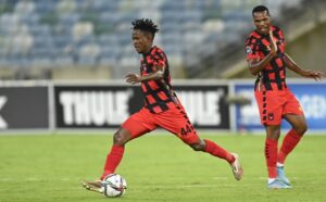Orebotse Mongae striking the ball
