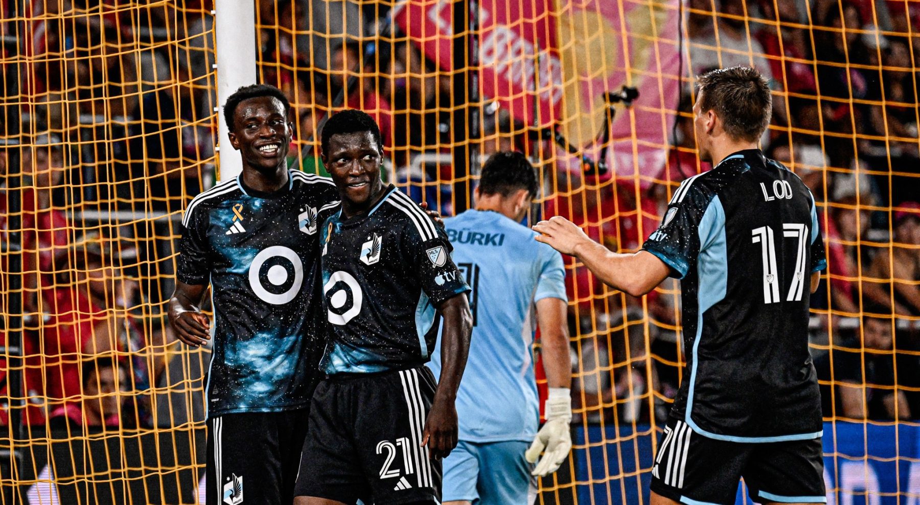 Bongokuhle Hlongwane celebrates a goal with Minnesota United teammates