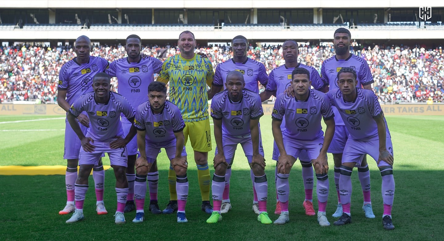 Cape Town City players pose for a photo before a match