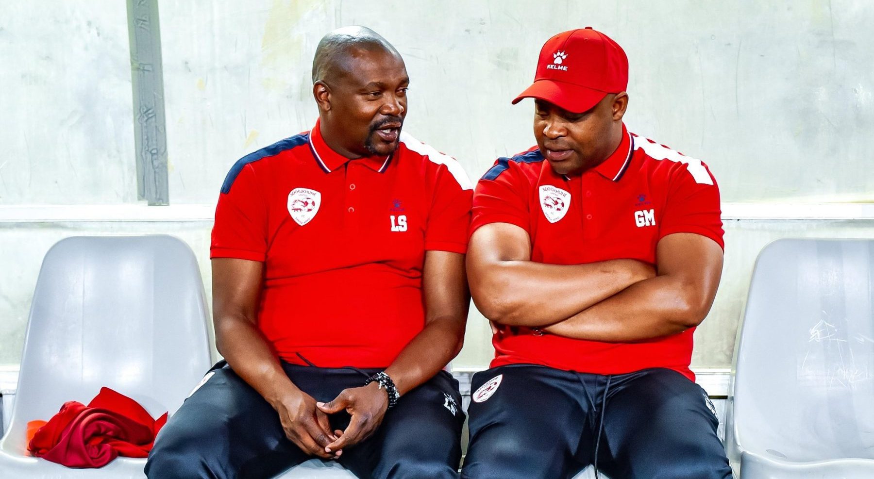 Sekhukhune United coach Lehlohonolo Seema and his colleague