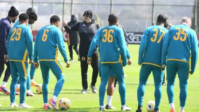 Nasreddine Nab of Kaizer Chiefs with his players at training