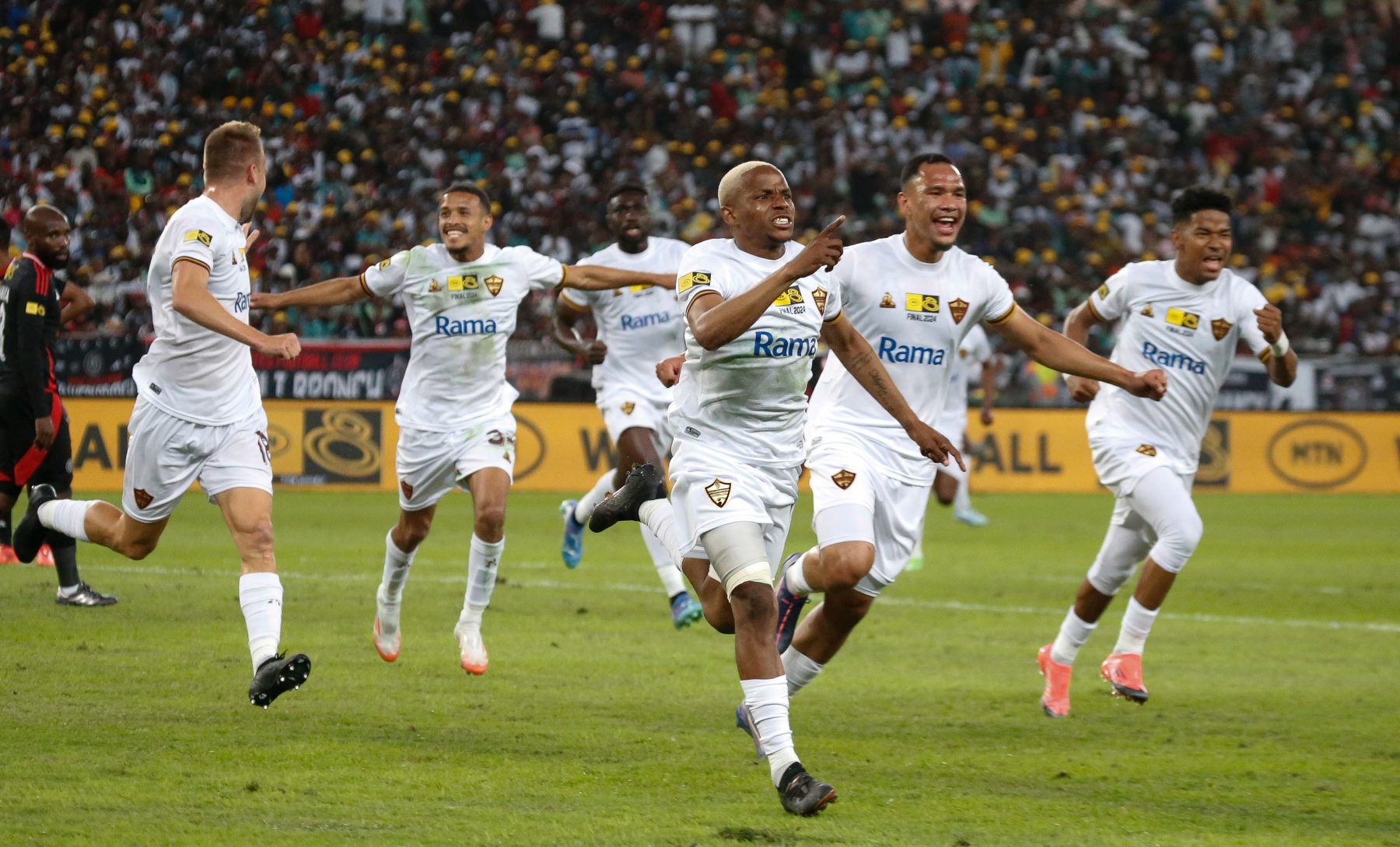 Stellenbosch FC players celebrate a goal in the MTN8 final