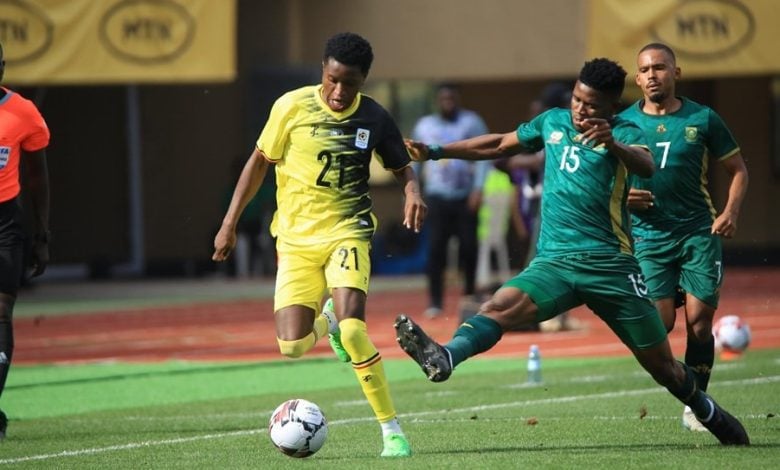 Bathusi Aubaas tackling Allan Okello in the Bafana Bafana vs Uganda AFCON qualifier