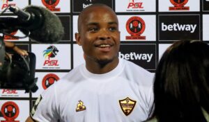Athenkosi Mcaba poses with a Man on the Match Award