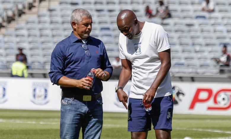 Clinton Larsen speaking with Papi Zothwane ahead of Magesi FC match against Orlando Pirates