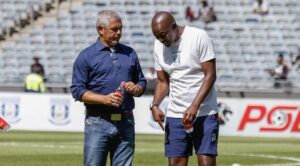 Clinton Larsen speaking with Papi Zothwane ahead of Magesi FC match against Orlando Pirates