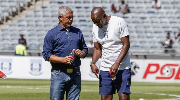 Clinton Larsen speaking with Papi Zothwane ahead of Magesi FC match against Orlando Pirates