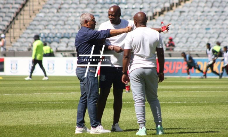 Clinton Larsen of Magesi FC before the Orlando Pirates game talking with other coaches