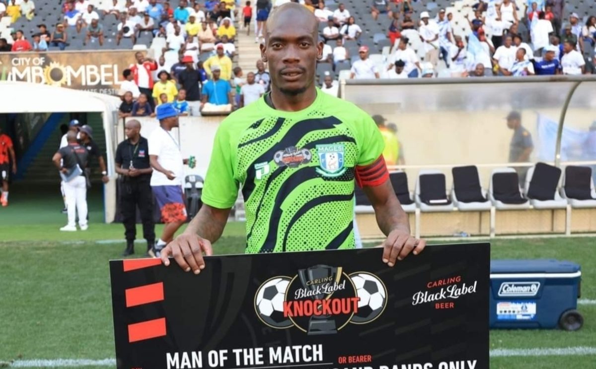 Magesi FC captain and goalkeeper Elvis Chipezeze with one of his Man of the Match cheques