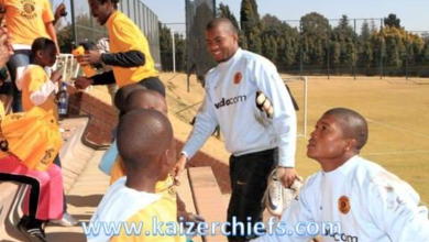 Kabelo Metsimetsi with Itumeleng Khune