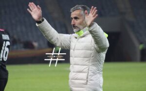 Jose Riveiro of Orlando Pirates waving to the fans