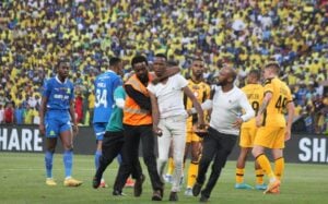 A Kaizer Chiefs fan on the field of play