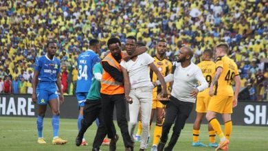 A Kaizer Chiefs fan on the field of play