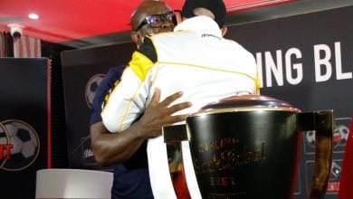 Nasreddine Nabi and Steve Khompela hugging after a press conference