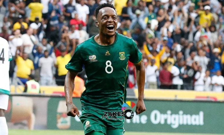 Patrick Maswanganyi, coached by Hugo Broos at Bafana Bafana celebrating a goal