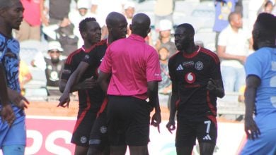 Referee confrontation by Orlando Pirates players during a PSL game