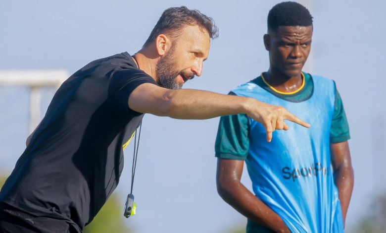 New Yanga SC coach Sead Ramovic with a player during a training session