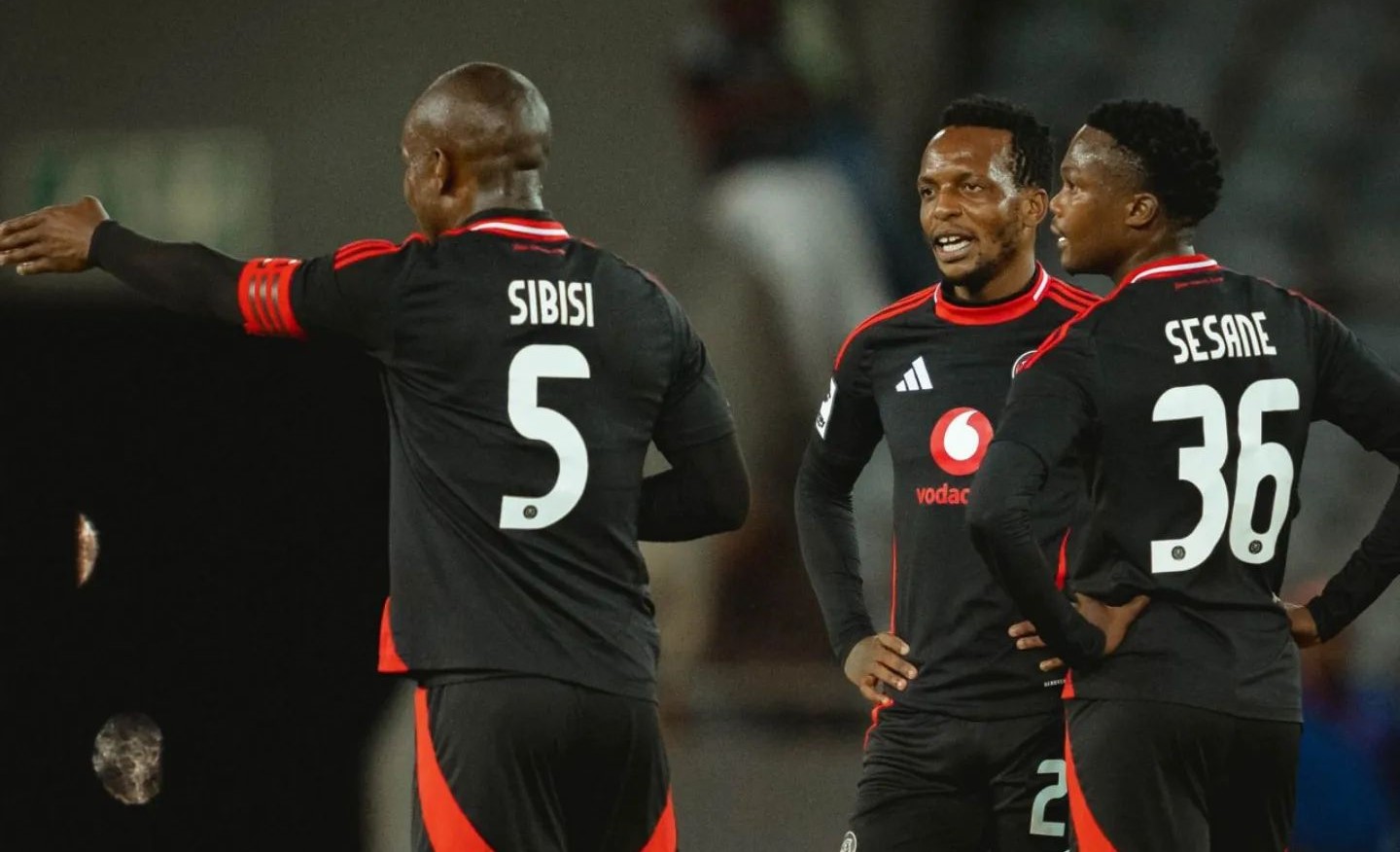 Orlando Pirates players Nkosinathi Sibisi [who's being advised by Siyabonga Sangweni] talking to Thabiso Sesane and Patrick Maswanganyi