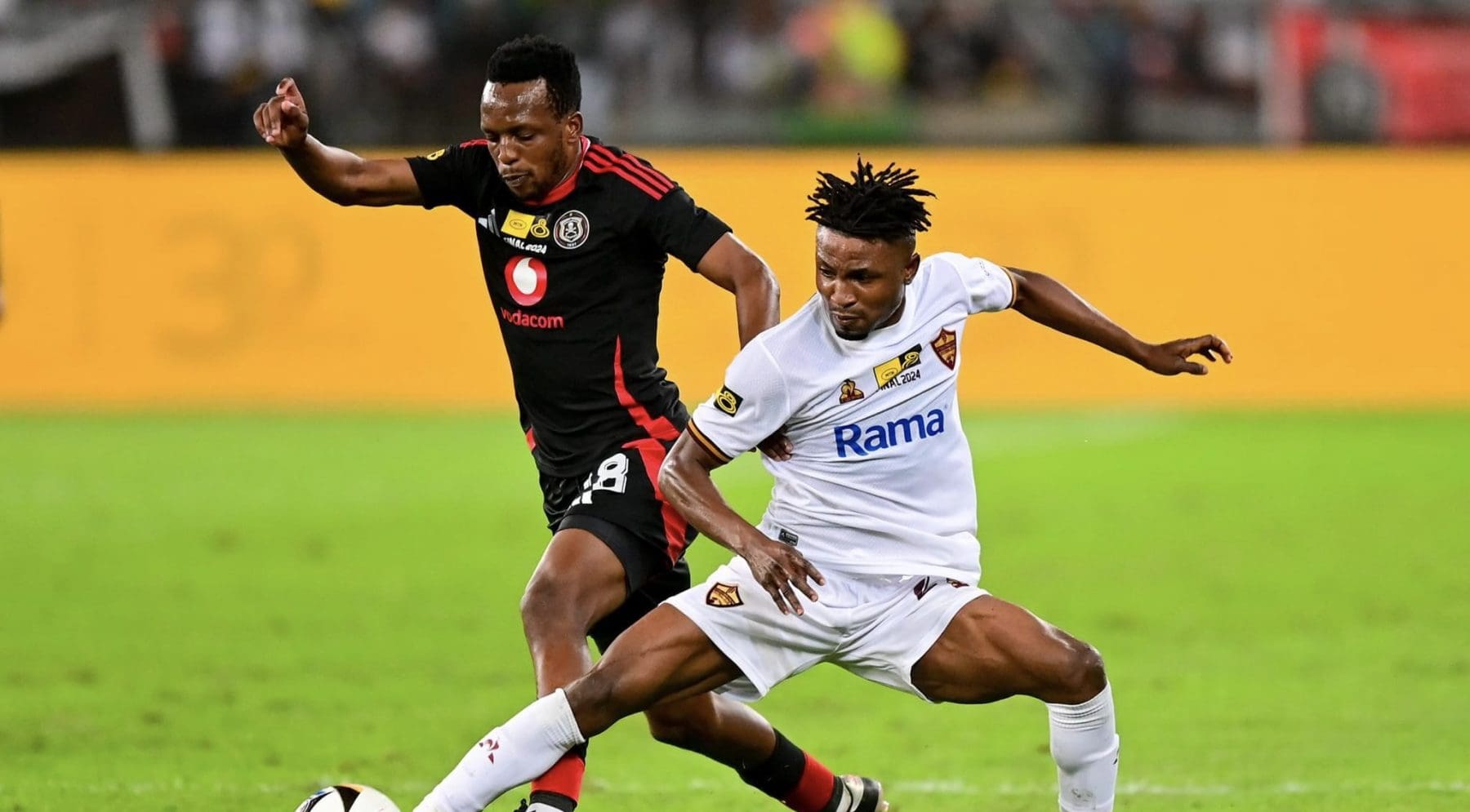 Stellenbosch’s Ibraheem Jabaar tacking Orlando Pirates attacking midfielder Patrick Maswanganyi 