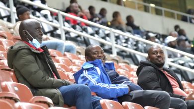 Jacob Sakala and Willy Moloto sitting at the stands