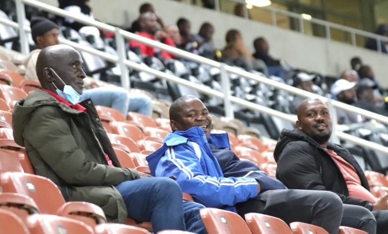 Jacob Sakala and Willy Moloto sitting at the stands