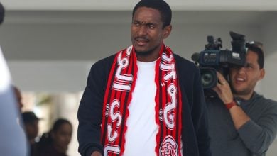 Wydad Casablanca's Rulani Mokwena walking before a game