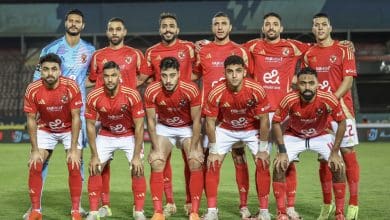 Al Ahly team posing for a team picture before the game