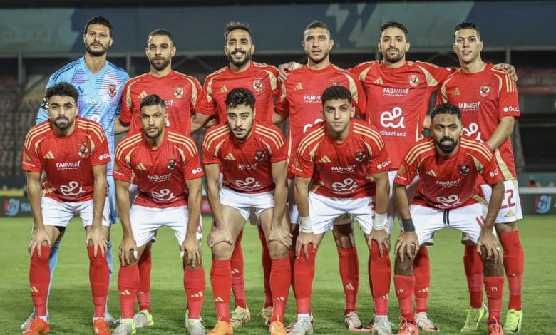 Al Ahly team posing for a team picture before the game