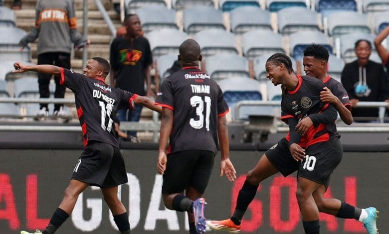 Carling All-Stars team in celebratory mood.