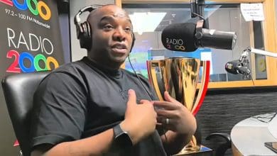 Benni McCarthy pointing at himself during an interview