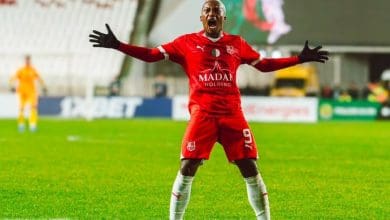 Khanyisa Mayo celebrates a goal for CR Belouizdad