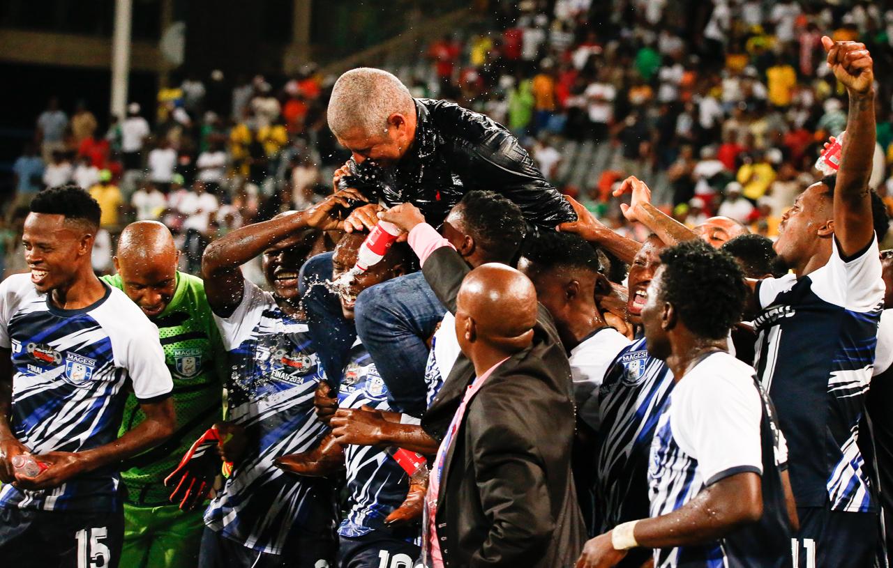 Magesi FC players celebrating with Clinton Larsen in good times.