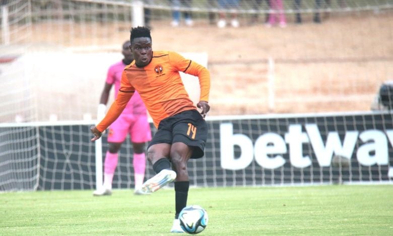 Rodney Maphangule kicking a ball