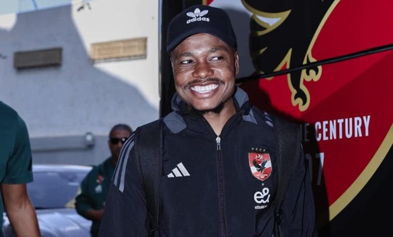 Percy Tau travelling with Al Ahly